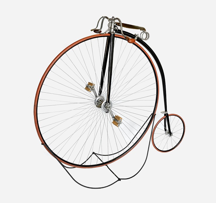 bicycle with a large front wheel.