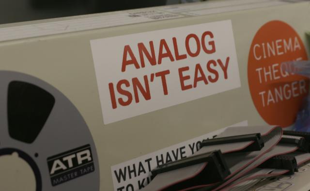 Sticker reading: "Analog isn't easy"