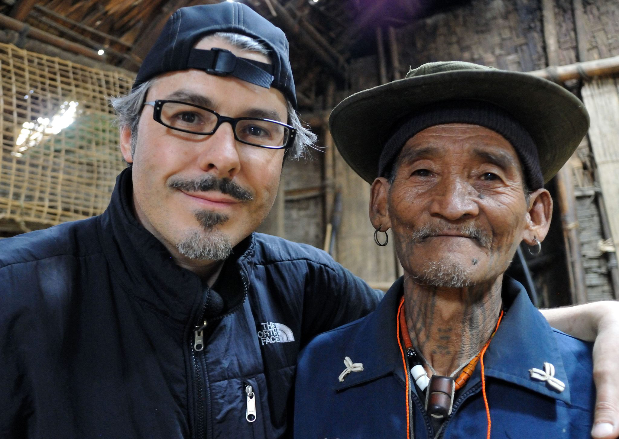 Lars Krutak with U’tan’Ke, a Macham Naga warrior and tiger hunter living in Myanmar. (Photo courtesy Lars Krutak)