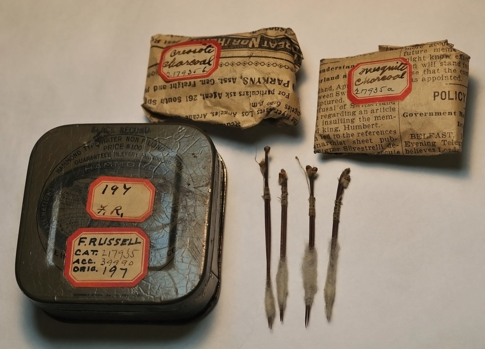 Akimel O'odham (Pima) tattooing kit from Arizona collected by Frank Russell, ca. 1900. Tattoos were made using cactus spines tied together with cotton. Creosote and mesquite charcoal were rubbed into the wounds. (Image courtesy Department of Anthropology, Smithsonian Institution)