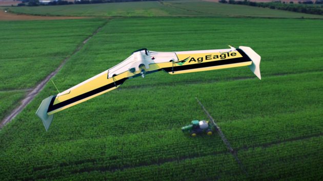 plane flying over field