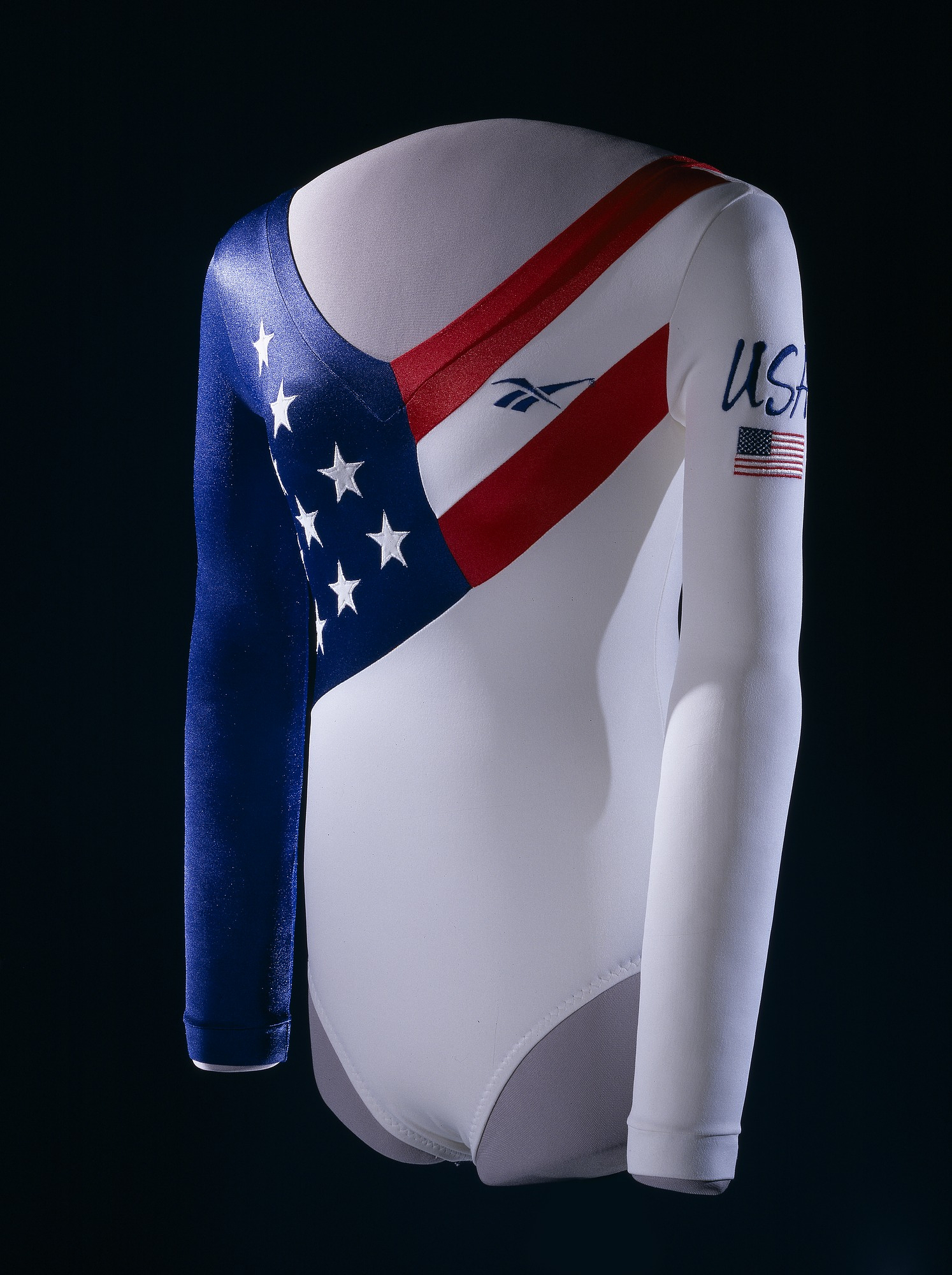 White leotard with long sleeves and imagery from the American flag