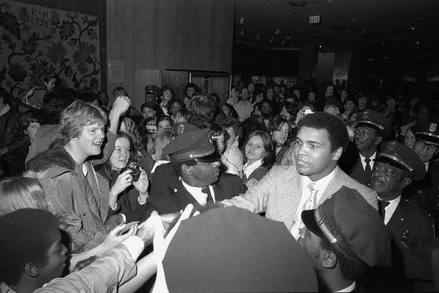 Muhammad Ali visiting the Smithsonian in a crowd