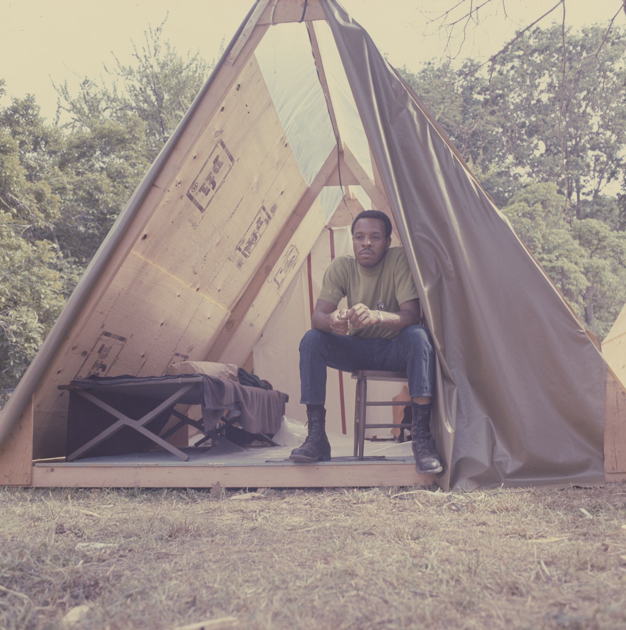 Man sits in a tent