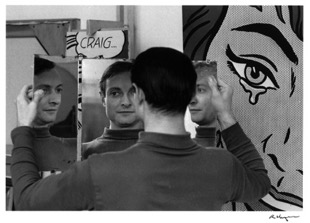 Artist Roy Lichtenstein in front of his paintings