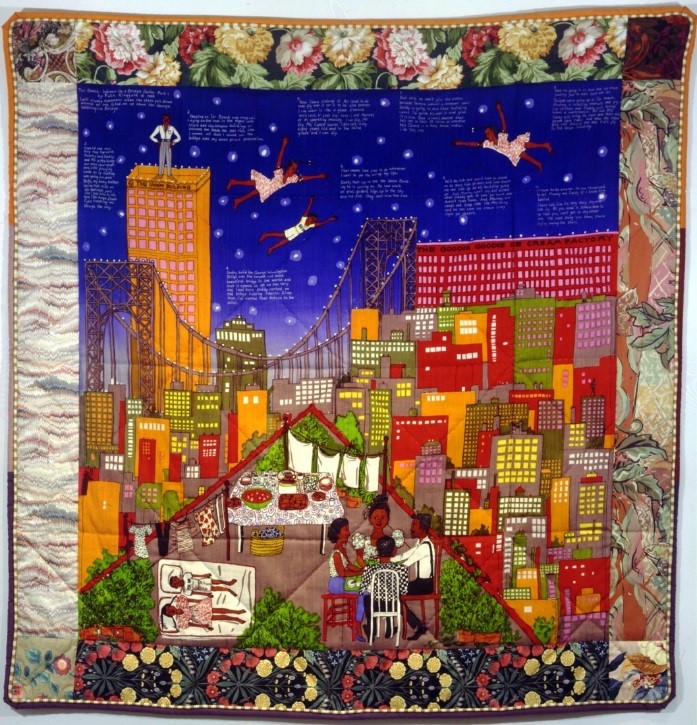 Colorful quilt featuring city skyline