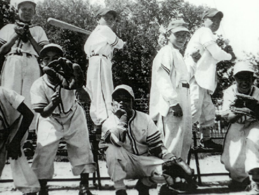 Youth baseball team posing