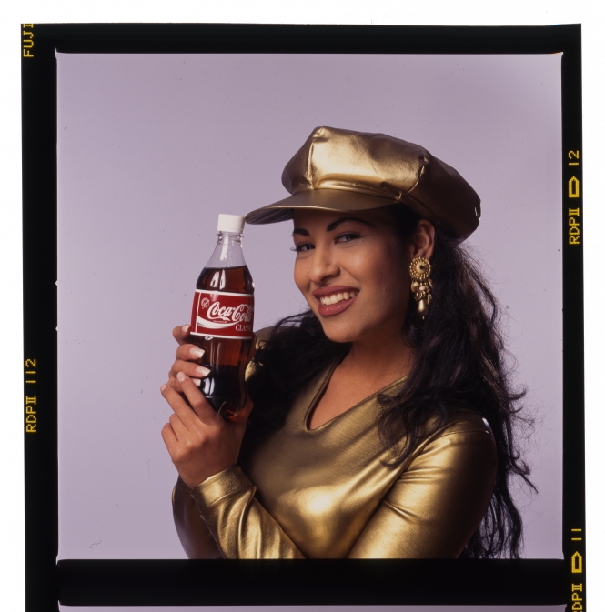 Singer Selena with bottle of Coke