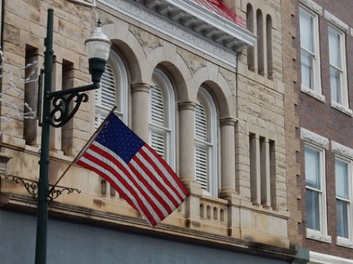 American flag on city lamppost 