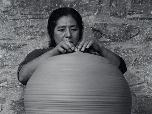 Woman with clay pot