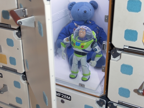 Buzz Lightyear and Magellan T. Bear in Space