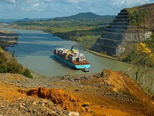 cargo ship traversing Panama Canal
