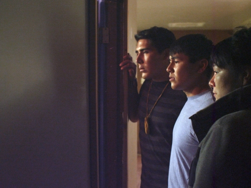 Movie Still of three young people in profile