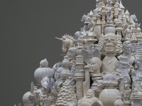 Close up of sculpture comprised of porcelain objects