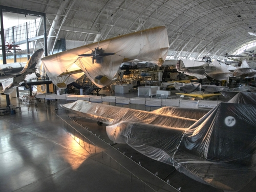 shrouded planes in hangar