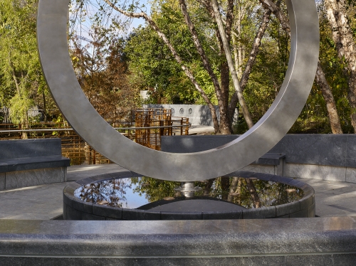 Upright circular sculpture shown outside