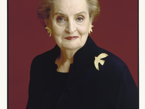 Color portrait of Madeleine Albright wearing bird pin