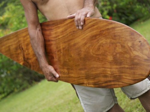 Tom Pohaku Stone with handcarved surfboard