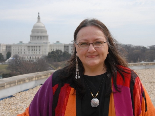 Harjo standing on the national Mall