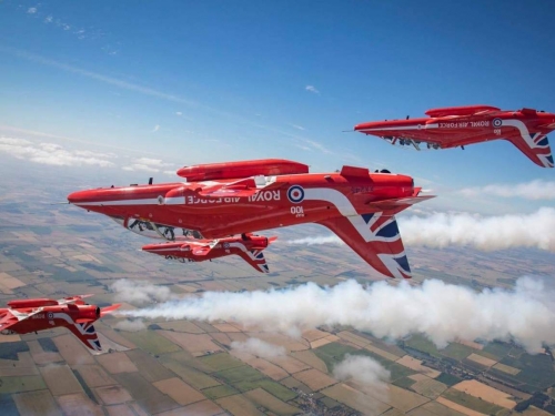 red planes flying upside down