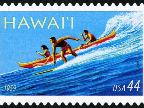 Surfer and Outrigger Canoe