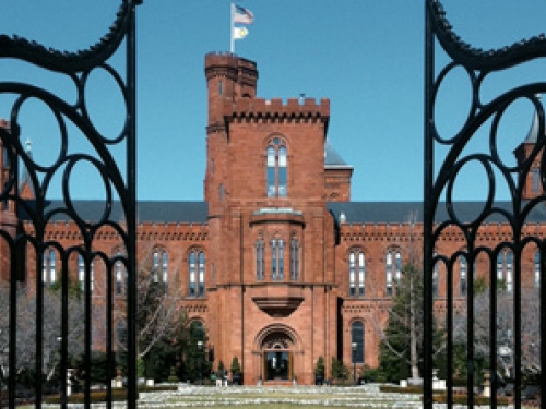 Smithsonian Castle seen through iron gates
