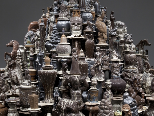 close up of sculpture comprised of porcelain objects