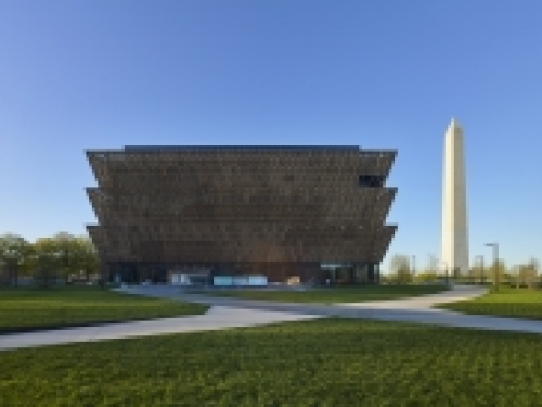 Museum exterior with Washington Monument in background