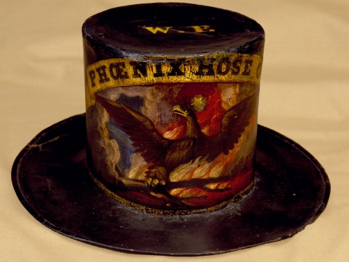Top hat painted with Phoenix Hose Co name and logo