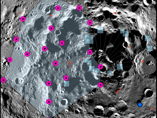 Photograph of rough moon surface with computer graphics showing small pink boxes at varying points.