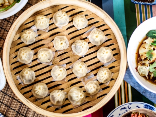 Asian food including steamed dumplings