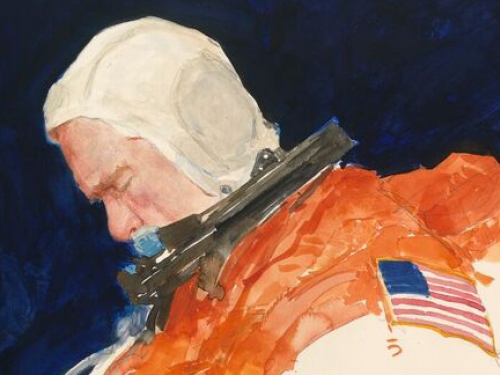 Cropped portrait of John Glenn in orange flightsuit