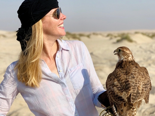 woman holding falcon
