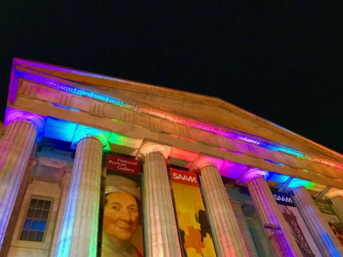 SAAM lit for Pride with rainbow lights in 2018.