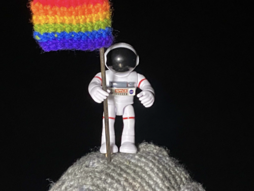 moon landing with crochet Pride flag