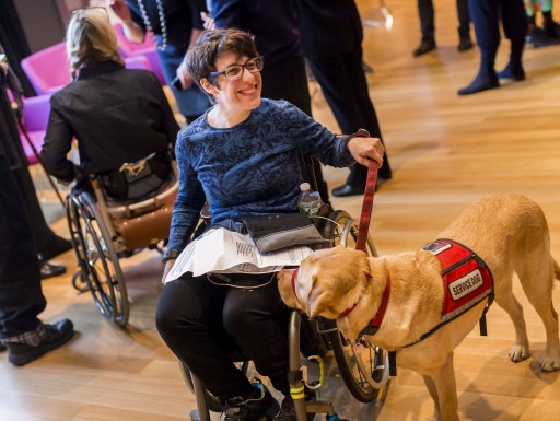 Participant with service dog at Cooper Hewitt Lab: Design Access symposium photo by Scott Rudd