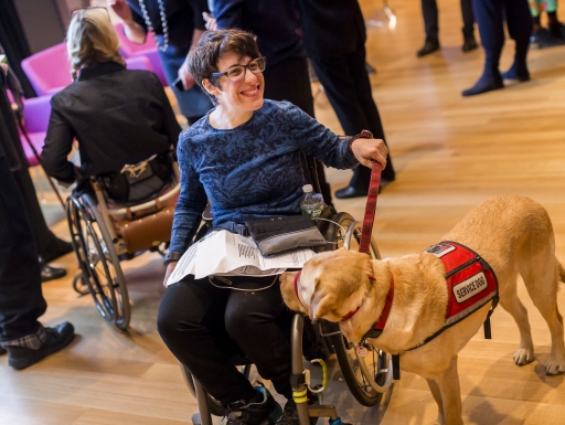 Participant with service dog at Cooper Hewitt Lab: Design Access symposium photo by Scott Rudd