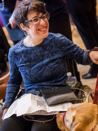 woman in a wheelchair enjoying a Smithsonian event
