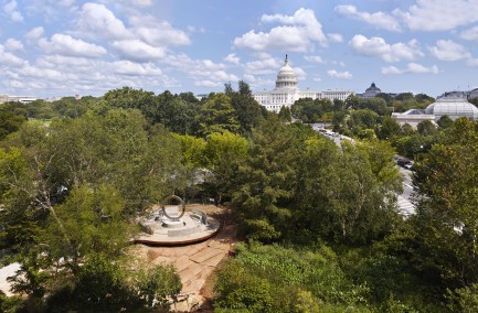 The Native American Veterans Memorial seen from above, with the Capitol in the background
