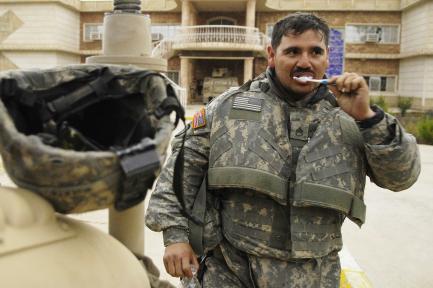 soldier brushing his teeth