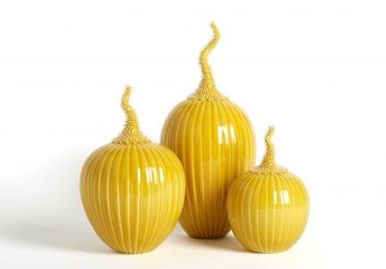 Three yellow vases