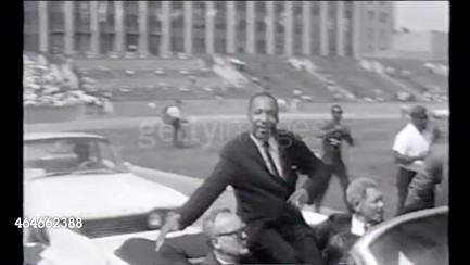 Video still of Martin Luther King in convertible