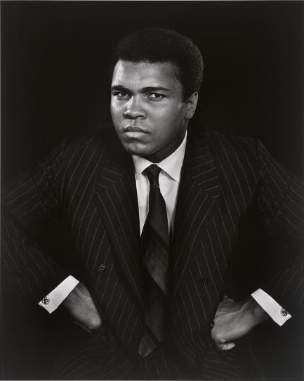 Portrait of Ali with hands on hips