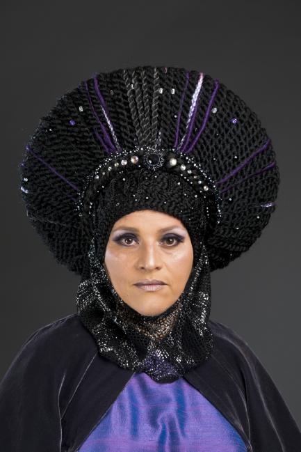 Photo of woman wearing elaborate headdress
