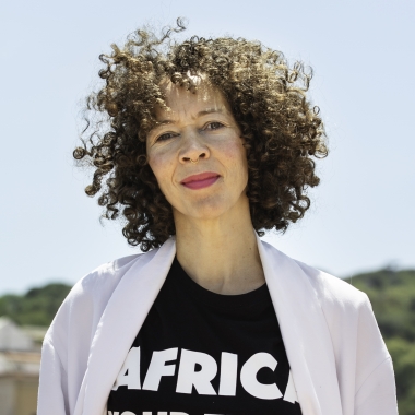 Ngaire in a black t-shirt that says Africa your time is now.