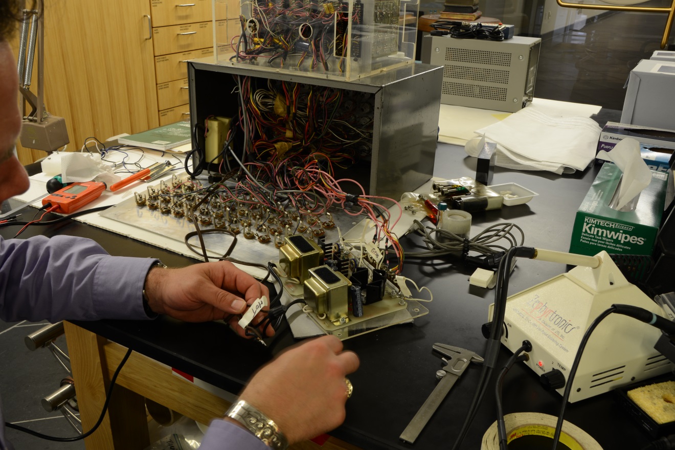 Removing the historic power supplies from the Video Analyzer after testing. 